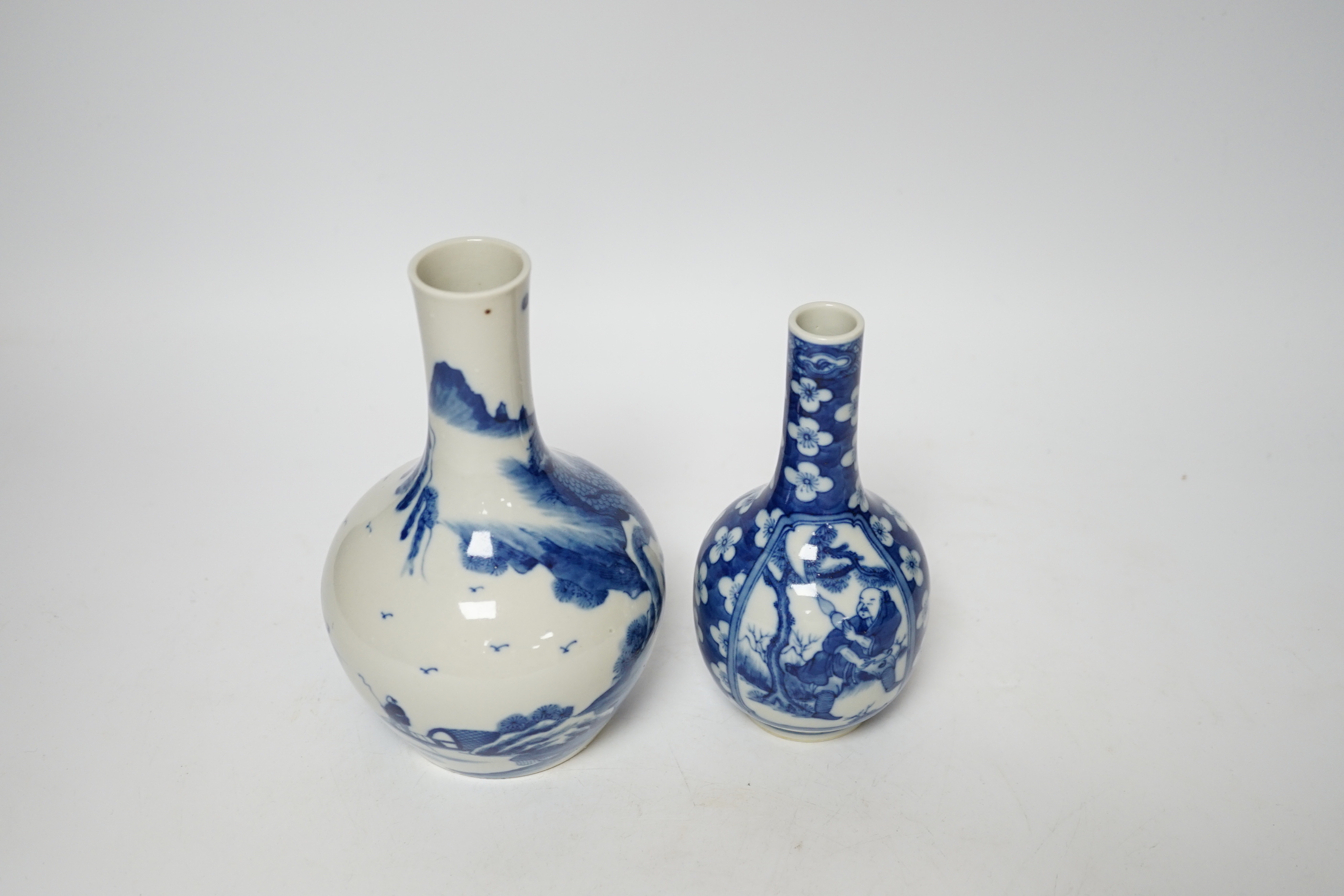 Two Chinese blue and white bottle vases, tallest 17cm